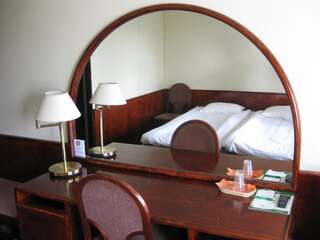 Отель Hotelli Tallukka Асиккала Стандартный двухместный номер с 1 кроватью или 2 отдельными кроватями и балконом-3